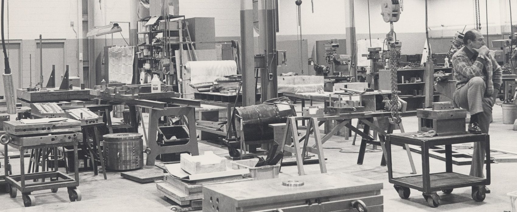 A black and white picture of the shop floor at Cavalier Tool in 1980.